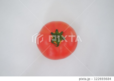 tomato on a white background, close-up tomato on a white background, close-up 122693684