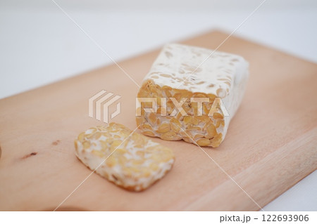 Tempeh is a traditional Indonesian food made from soybeans fermented with the Rhizopus oligosporus fungus Tempeh is a traditional Indonesian food made from soybeans fermented with the Rhizopus oligosporus fungus 122693906