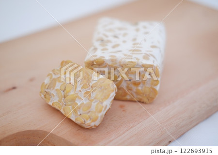 Tempeh is a traditional Indonesian food made from soybeans fermented with the Rhizopus oligosporus fungus Tempeh is a traditional Indonesian food made from soybeans fermented with the Rhizopus oligosporus fungus 122693915
