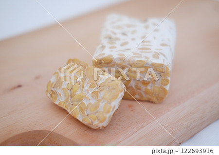 Tempeh is a traditional Indonesian food made from soybeans fermented with the Rhizopus oligosporus fungus Tempeh is a traditional Indonesian food made from soybeans fermented with the Rhizopus oligosporus fungus 122693916