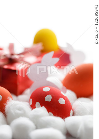 Happy Easter eggs and gift boxes on white background. Easter decoration. 122695941