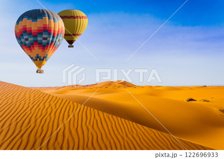 Desert and hot air balloon Landscape at Sunrise. Travel, inspiration, success, dream, flight concept 122696933