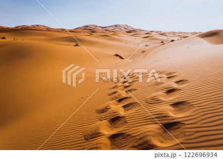 Majestic beautiful scene of Merzouga dunes of Sahara desert Morocco. 122696934