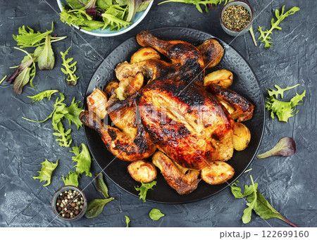 Grilled whole poultry. 122699160