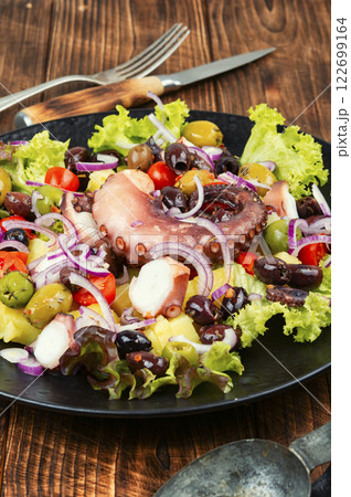 Fresh octopus salad. 122699164
