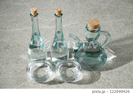 Clear distilled table vinegar in a glass bowls Clear distilled table vinegar in a glass bowls 122699426
