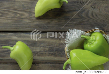 fresh green sweet (capsicum) pepper. Homemade green pepper with green leaves .bell pepper, Freshly harvested peppers 122699630