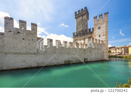 The walls of the Scaligero Castle on Lake Garda in historical centre of Sirmione, Italy, Europe. 122700241