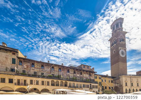 Piazza delle Erbe square with Torre dei Lamberti tower in historic centre of Verona town, Italy, Europe. 122700359