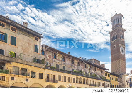 Piazza delle Erbe square with Torre dei Lamberti tower in historic centre of Verona town, Italy, Europe. 122700361