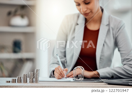 Pay, money and hands busy with tax files for the financial year and season. Advisor or accountant doing paperwork and checking debt for client as well as profit that should be paid to their account. 122701947
