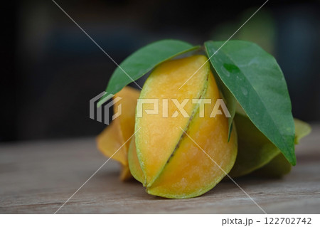 Close up of Carambola fruit on wood table,selective focus 122702742