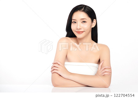 Beautiful young asian woman with clean fresh skin on white background, Face care, Facial treatment, Cosmetology, beauty and spa, Asian women portrait. Beautiful young asian woman with clean fresh skin on white background, Face care, Facial treatment, Cosmetology, beauty and spa, Asian women portrait. 122704554