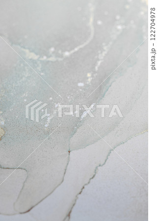 Beautiful abstract alcohol ink art in soft hues creating a serene atmosphere 122704978