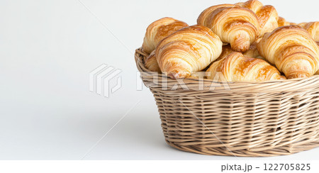 Delicious basket of freshly baked croissants against a clean white background, AI Generative Delicious basket of freshly baked croissants against a clean white background, AI Generative 122705825