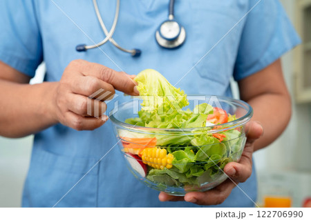 Asian Nutritionist holding healthy food for patient in hospital, nutrition and vitamin. 122706990