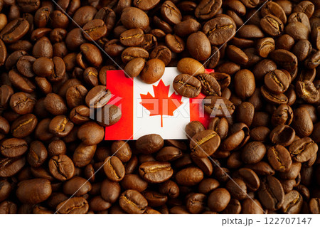 Canada flag on coffee beans, shopping online for export or import food product. 122707147