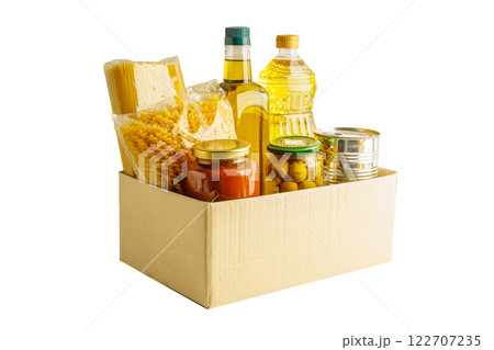 Foodstuffs in donation box for volunteer to help people. Foodstuffs in donation box for volunteer to help people. 122707235