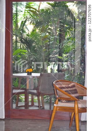 View of the terrace in abstract Ubud resort with summer garden View of the terrace in abstract Ubud resort with summer garden 122707696