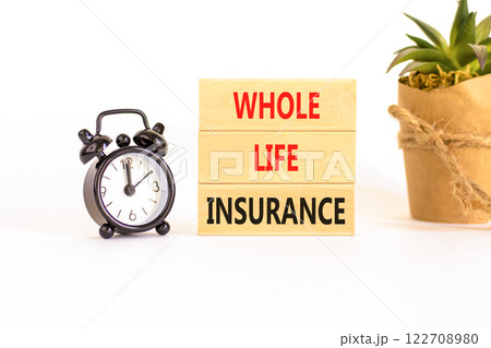 Whole life insurance symbol. Concept words Whole life insurance on beautiful wooden blocks. Beautiful white background. Black alarm clock. Business whole life insurance concept. Copy space. 122708980