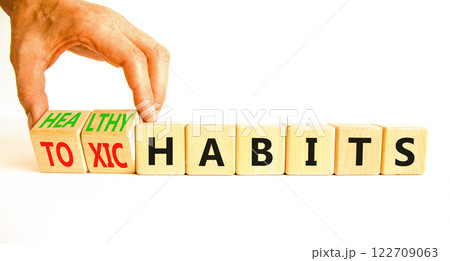 Healthy or toxic habits symbol. Concept words Healthy habits or Toxic habits on beautiful wooden blocks. Beautiful white table white background. Business healthy or toxic habits concept. Copy space. Healthy or toxic habits symbol. Concept words Healthy habits or Toxic habits on beautiful wooden blocks. Beautiful white table white background. Business healthy or toxic habits concept. Copy space. 122709063