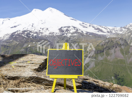 Objectives symbol. Concept word Objectives on beautiful chalk blackboard. Mountain Elbrus. Beautiful mountain Elbrus background. Business objectives concept. Copy space. Objectives symbol. Concept word Objectives on beautiful chalk blackboard. Mountain Elbrus. Beautiful mountain Elbrus background. Business objectives concept. Copy space. 122709082