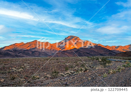 Rugged Arizona desert landscape with golden sunset light on the mountains 122709445