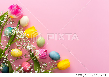 Easter eggs and tulips with gypsophila 122711731