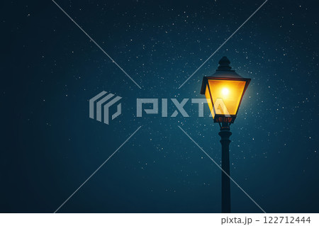 Vintage street lamp glowing under a starry night sky 122712444