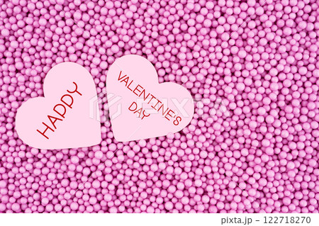 Happy Valentine's Day background. Top view of a heart-shaped on foam beads. 122718270