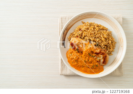 grilled chicken steak with red curry sauce and rice 122719168