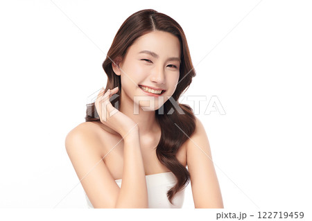 Beautiful young asian woman with clean fresh skin on white background, Face care, Facial treatment, Cosmetology, beauty and spa, Asian women portrait. Beautiful young asian woman with clean fresh skin on white background, Face care, Facial treatment, Cosmetology, beauty and spa, Asian women portrait. 122719459