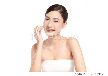 Beautiful young asian woman with clean fresh skin on white background, Face care, Facial treatment, Cosmetology, beauty and spa, Asian women portrait. Beautiful young asian woman with clean fresh skin on white background, Face care, Facial treatment, Cosmetology, beauty and spa, Asian women portrait. 122719470