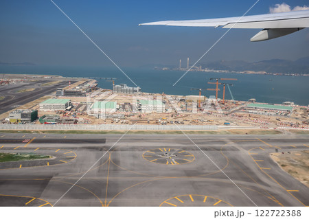 Airport Airfield with Runway, and Airplane Wing, hk Dec 3 2024 Airport Airfield with Runway, and Airplane Wing, hk Dec 3 2024 122722388