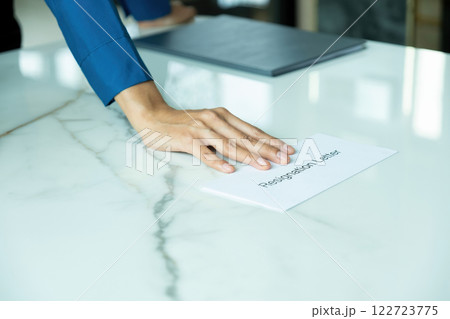 A woman handing resignation letter. 122723775