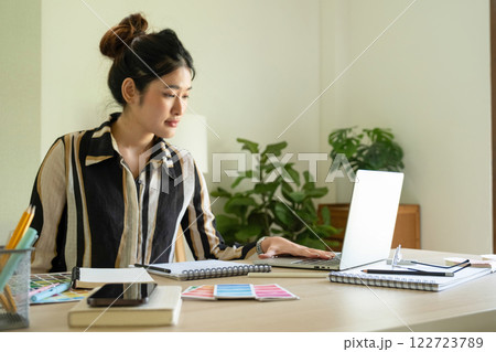 Young designer working on color palette. 122723789