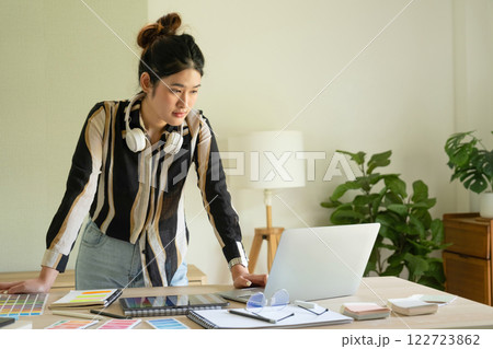 Young designer working on color palette. 122723862