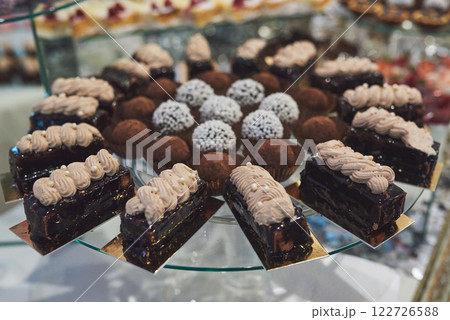 delicious colorful cookies and cakes on the wedding candy bar. 122726588
