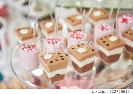 Delicious sweets on candy buffet Delicious sweets on candy buffet 122726615