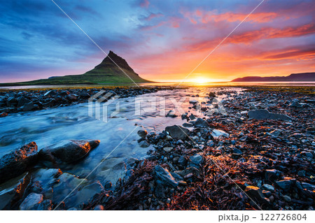 The picturesque sunset over landscapes and waterfalls. Kirkjufell mountain,Iceland 122726804