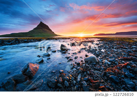The picturesque sunset over landscapes and waterfalls. Kirkjufell mountain,Iceland 122726810