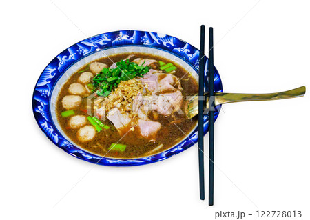 Top view of Chinese clear soup and Beef noodle and chopsticks ,die cut on white isolated, focus selective Top view of Chinese clear soup and Beef noodle and chopsticks ,die cut on white isolated, focus selective 122728013