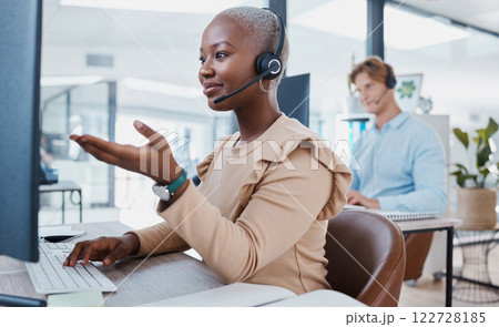 Call center, customer service and support with an agent working to help on a call online in her office. Contact us, telemarketing and consulting with a consultant in a headset giving helpful advice 122728185