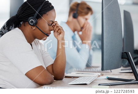 Burnout, stress and headache telemarketing employee working customer support for sales, consulting or call center company. Contact us, help desk and customer service worker in office by computer Burnout, stress and headache telemarketing employee working customer support for sales, consulting or call center company. Contact us, help desk and customer service worker in office by computer 122728593