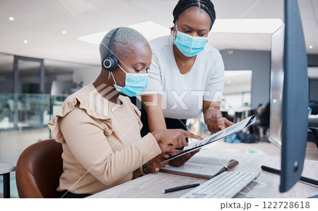 Business woman with documents and manager during covid work on global internet marketing data or team financial chart. Business people with trust and support in management at office desk and computer Business woman with documents and manager during covid work on global internet marketing data or team financial chart. Business people with trust and support in management at office desk and computer 122728618