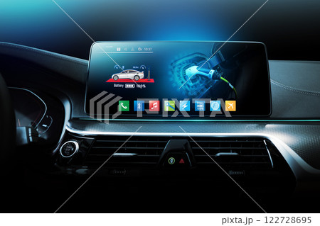 Electric car display screen that is showing the display of electric charging. 122728695