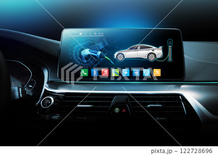 Electric car display screen that is showing the display of electric charging. 122728696