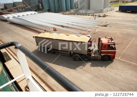 Delivery, cargo and shipping truck in an industrial, manufacturing and distribution job site. Export transport lorry of ecommerce, factory and industry supply chain product stock at a freight depot Delivery, cargo and shipping truck in an industrial, manufacturing and distribution job site. Export transport lorry of ecommerce, factory and industry supply chain product stock at a freight depot 122728744