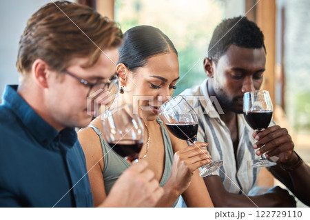 Diversity, luxury and friends wine tasting at a restaurant or vineyard, smelling alcohol in a glass together. Young carefree people bonding and having fun, enjoying a wine tour at a distillery Diversity, luxury and friends wine tasting at a restaurant or vineyard, smelling alcohol in a glass together. Young carefree people bonding and having fun, enjoying a wine tour at a distillery 122729110