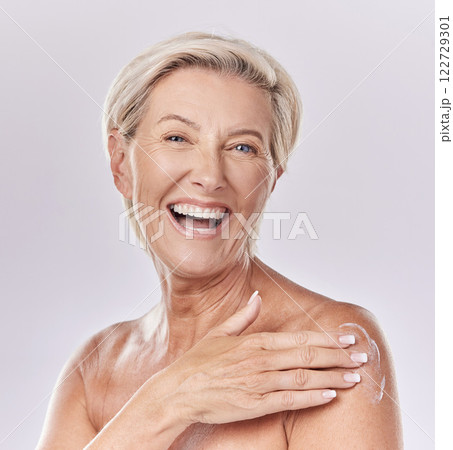 Sunscreen, skincare and body care of senior woman applying cream to skin with a studio portrait. Skin care, clean and hygiene model with anti aging wrinkles or moisturizing product for aging wellness 122729301